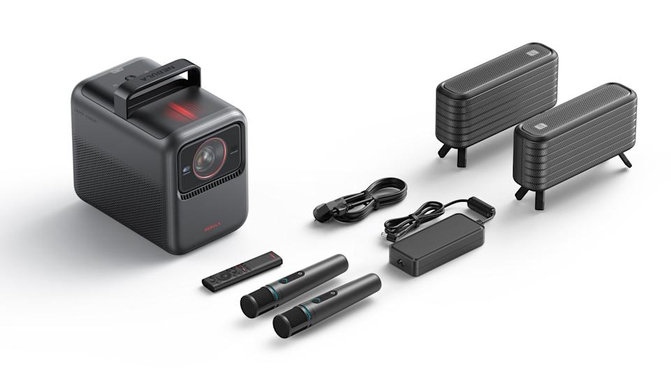Image of the Nebula X1 Projector alongside its accessory bundle on a white background.