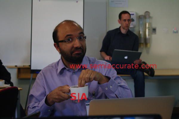 Anand Lal Shimpi dunking a biscuit at ARM Tech Day 2013