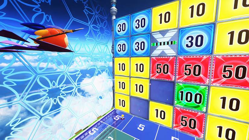 A waddle dee glides towards a point board in Kirby Air Riders.