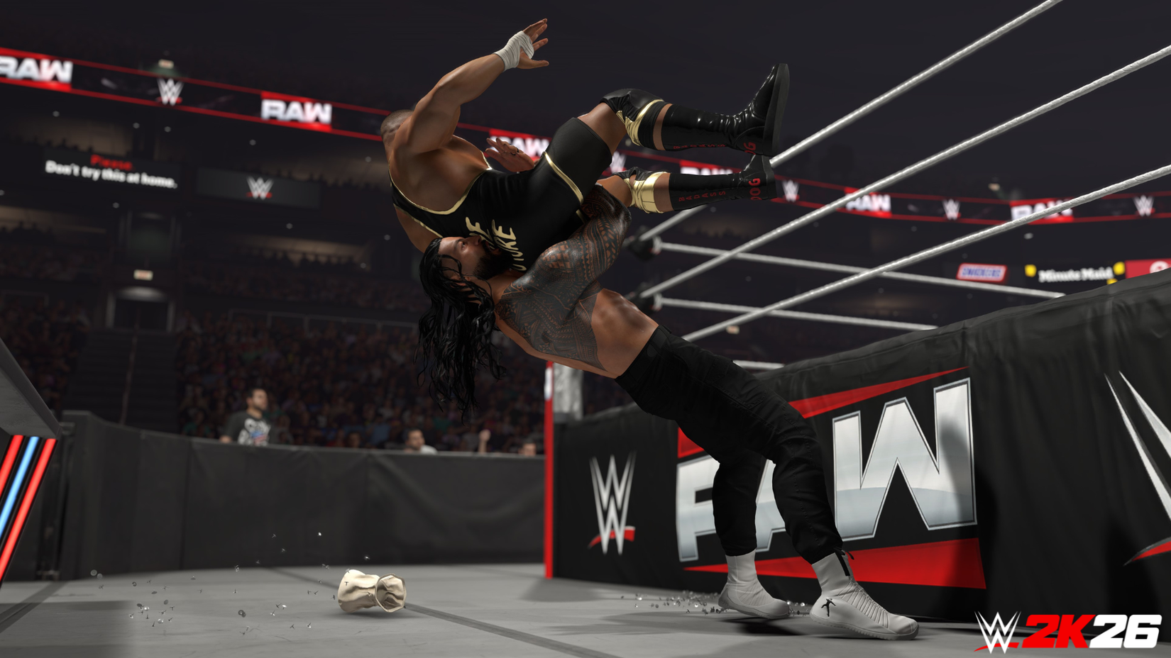 Roman Reigns slams Bronn Breaker onto thumbtacks in WWE 2K26